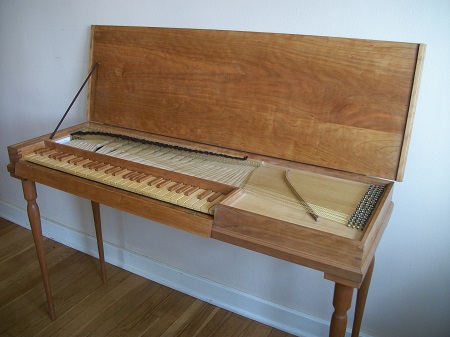 18th-century double-fretted clavichord in figured cherry